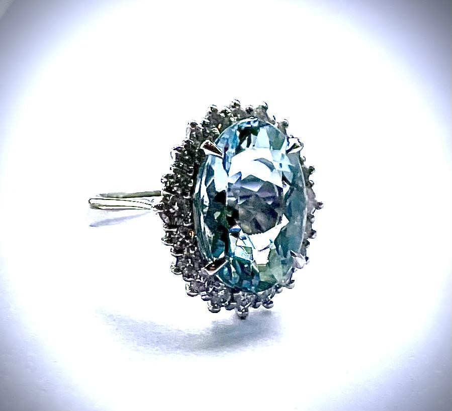 Aquamarine ring — 5.61ct aquamarine · 0.78ct diamond